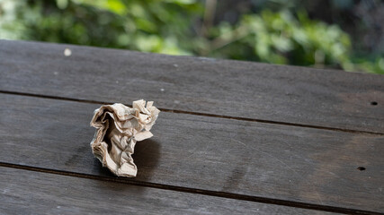 Tissue paper crumpled napkin placed on the table blurred background