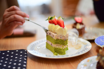 People eating dessert in coffee.