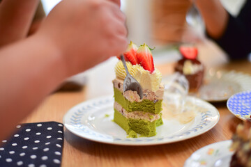 People eating dessert in coffee.