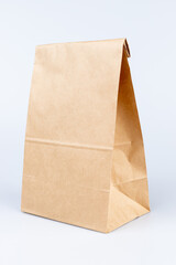 Brown paper bags on white background