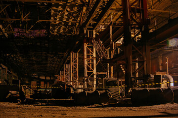 Old broken empty abandoned industrial building interior at night