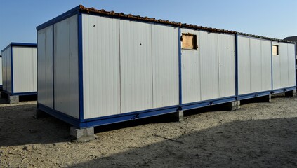 Portacabin, porta cabin, temporary labours camp , Mobile building in industrial site or office container Portable house and office cabins. Labor Camp. Porta cabin. small temporary houses