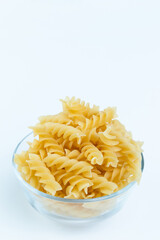 Raw pasta in a cup.