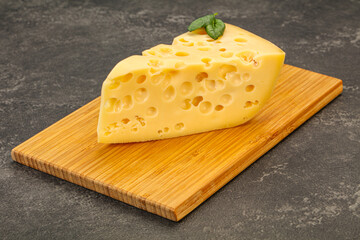 Maasdam cheese - yellow triangle with holes
