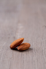 closed up almonds  on wooden table