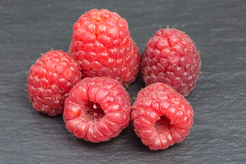 heap of ripe red raspberries