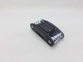 Black Stainless Steel Useful Multi Purpose Tools Kit for Mechanic Fix Functions in White Isolated Background 