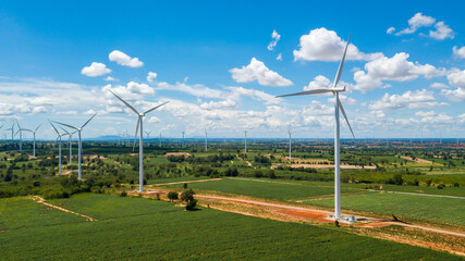 Aerial Landscape of windmills farm with white sky on blue sky