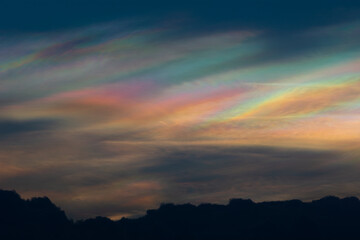 Obraz premium iridescent clouds appear during the sunset.