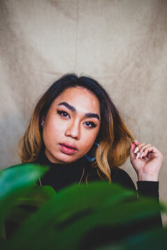 Portrait of a young nonbinary adult, Asian Filipino
