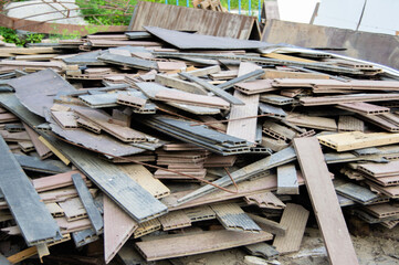 a pile of old wooden building materials
