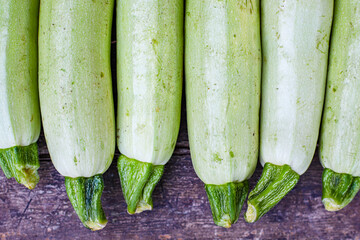 zucchini fruits fresh harvest food background top view copy space for text organic eating healthy raw keto or paleo diet