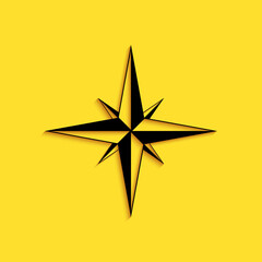 Fototapeta premium Black Wind rose icon isolated on yellow background. Compass icon for travel. Navigation design. Long shadow style. Vector.