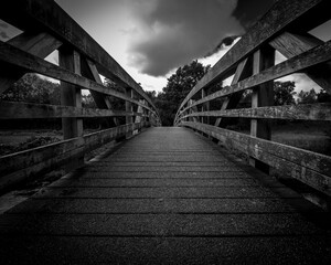 Symmetrical wooden footbridge over the river Ribble in Clitheroe, Ribble valley