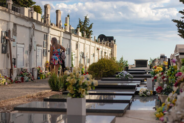 Primosten Croatia July 2020 Old traditional christian graveyard and tombstone, located in the town of Primosten on the adriatic sea coast. Cloudy summer day with sun rays poking through.