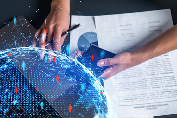 Social network theme hologram and a woman signing contract use phone. Multiexposure.