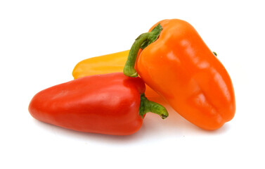 Colorful chilli peppers on white background