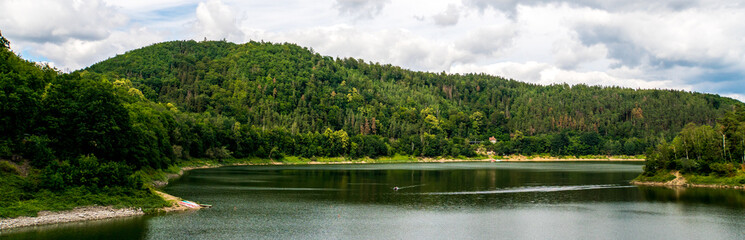 Fototapeta na wymiar Pilchowickie Lake among the forested mountains