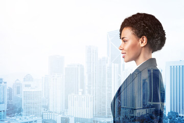 Fototapeta na wymiar Successful smiling black African American business woman in suit. Kuala Lumpur cityscape. The concept of woman in business. KL skyscrapers. Double exposure.