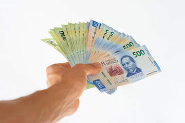 Hand holding money mexican pesos bucks