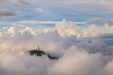 Landscape view at sunrise with puffy foggy.
Foggy covered in the morning of Phu Thap Boek, Thailand.
