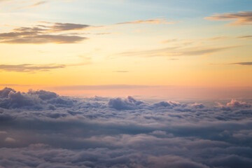 View at sunrise with puffy foggy. White puffy like cloud stretching to foggy horizon in the bright morning. Phu Thap Boek, Phetchabun, Thailand.