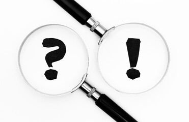 Exclamation mark and question mark in the focus
