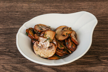 Roasted champignon with herbs and spices