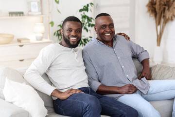 Mature Father And Son. Happy Millennial Man Posing With Dad At Home
