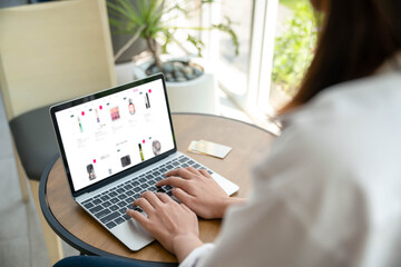 Asian young woman Sit working by notebook relaxation in cafe. Lifestyle women in the city concept.