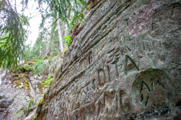 Rock embossing - Sietiniezis rock, Vaidava, Latvia