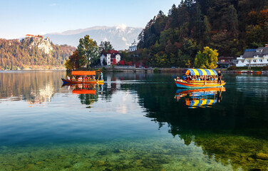 Sunny morning scene of Bled lake and is overlooked by Bled Castle. popular touristic place. summer...