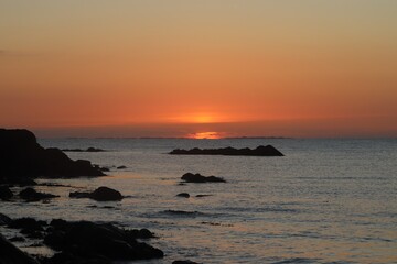 Fototapeta premium Sunset over the sea, Benbecula, Outer Hebrides, Scotland
