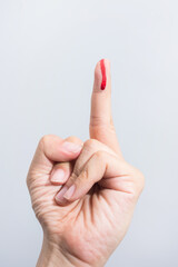 Bleeding blood from the cut finger wound. Injured finger with bleeding open cut wound. Closeup of...