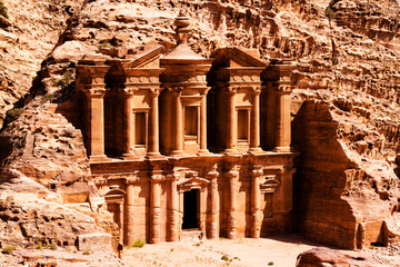 The stunning view of Ad Deir, the Monastery of Petra, Jordan on a clean blue sky day.