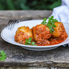 pepper stuffed with stuffing meat and vegetables tomato sauce second course food background top view copy space for text organic eating healthy keto or paleo pescetarian diet