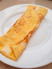 Omelette por la mañana
ingredientes huevos, jamón de pavo y queso