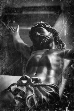 The crucifixion of Jesus Christ. Retro styled image of an ancient statue.