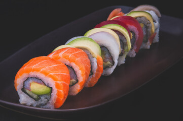 Mix sushi roll salmon and other fishes.