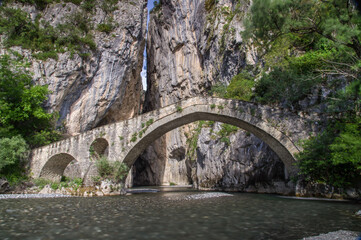 Stone bridge of Portitsa and Ziaka in Epirus mountains near Grevena in Greece