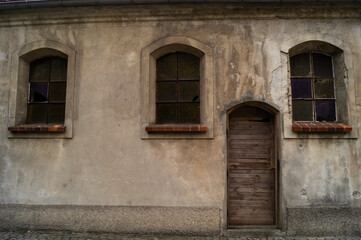 old wooden windows with shutters and doors