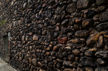 stone wall with wooden door