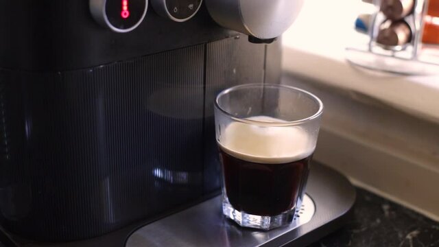 Delicious coffee being made in kitchen