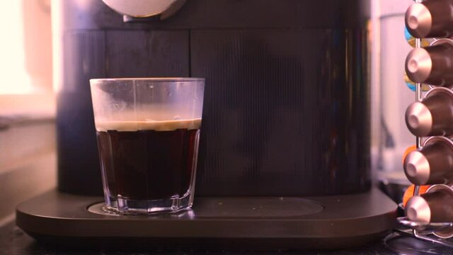 Delicious coffee being made in kitchen
