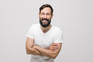  smiling happy young man in the studio on a white background