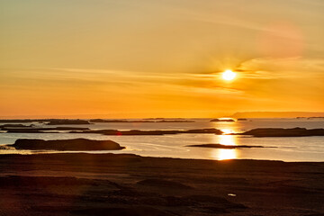 Fototapeta na wymiar Many islands at sunset in Iceland