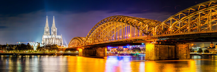 Panorama of the Hohenzollern Bridge over the Rhine River and Cologne Cathedral by night	
