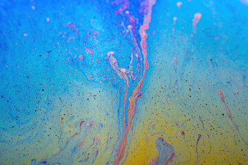 Abstract background texture of iridescent paints. Soap bubble