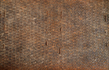 rusty metal sheet with a grid as the background