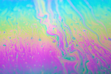 Fototapeta na wymiar Abstract background texture of iridescent paints. Soap bubble